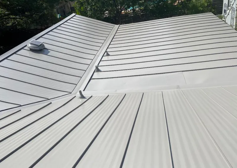 Solar attic fan installed on a metal roof for Roof Ventilation in Rio del Mar